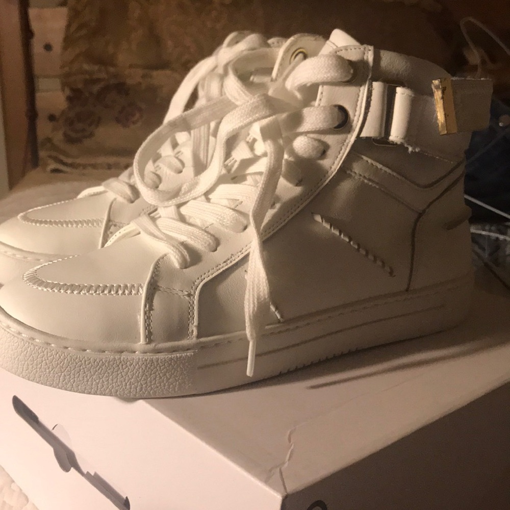 Clean white high top sneakers